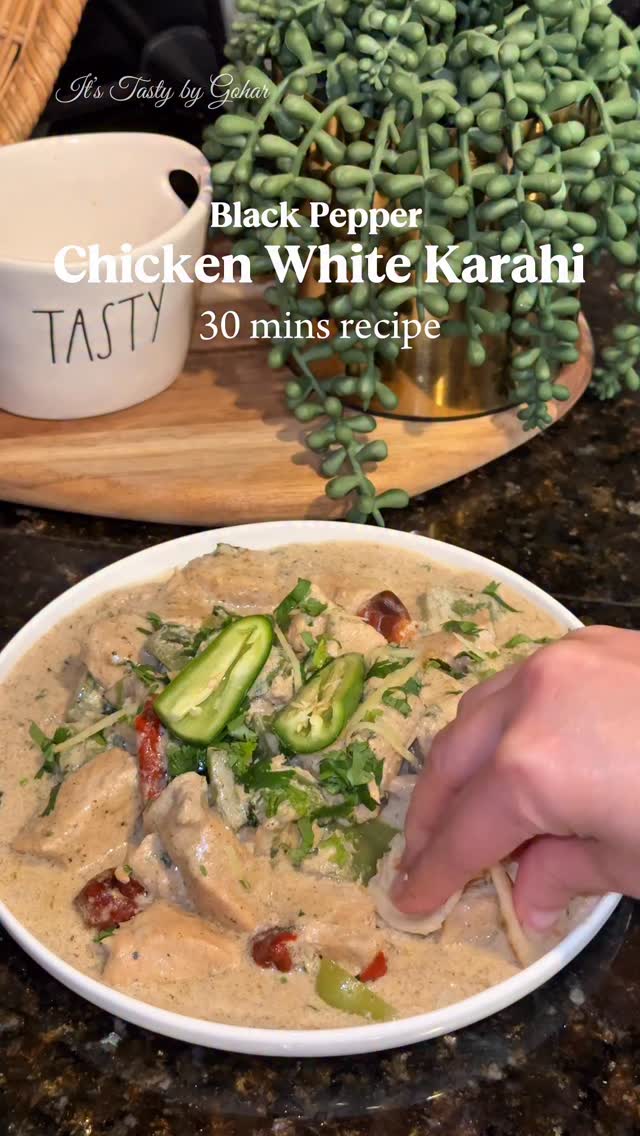 ✨Black Pepper Chicken White Karahi – 30 mins recipe✨

If you’re looking for a rich, flavorful, and restaurant-style chicken dish, Black Pepper Chicken White Karahi is the perfect recipe for you! This dish combines the bold heat of freshly ground black pepper with the creamy goodness of yogurt and fresh cream, creating a mouthwatering balance of spice and silkiness.

Find more recipes on my YouTube channel and website - link in bio 

Like, share and save the reel now and follow for more recipes 😍

R e c i p e ⬇️ 

INGREDIENTS: 
2 lbs Chicken boneless cut into cubes
2 tbsp butter
Oil
2 tbsp ginger garlic paste
1/2 cup yogurt
1 tsp cumin powder
1 tsp crushed black pepper
1 tsp black pepper powder
4-5 red button chili optional
salt to taste
200 ml cream
Capsicum (shimla mirch) cubed
Cilantro
Ginger
Green chilies
lemon juice

INSTRUCTIONS:
In a bowl, mix chicken with ginger garlic paste, yogurt, crushed and ground black pepper, cumin powder, and salt.
Let it marinate for at least 30 minutes.
Heat oil in a pan, add butter, then add the marinated chicken.
Cook on medium heat until the chicken changes color and releases its juices.
Add the cream and mix well.
Add chopped capsicum and sauté for a minute.
Cover and let it simmer for a few minutes until the chicken is fully cooked and flavors are well combined.
Garnish with fresh coriander, julienned ginger, green chilies, and a squeeze of lemon juice.
Enjoy! Serve hot with naan or roti.

[black pepper chicken white Karahi, white Karahi, white chicken Karahi, 30 mins recipe, quick meal ideas]