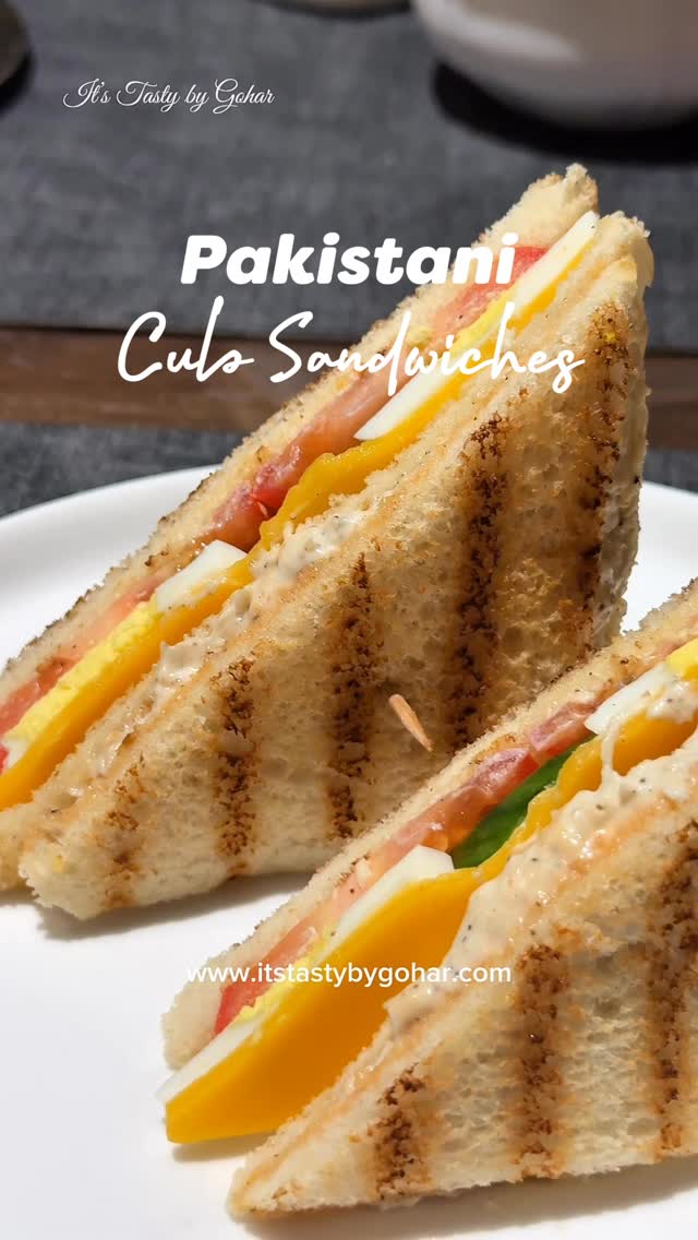 Pure Nostalgia in Every Bite – Pakistani Style Club Sandwich 🥪 
Make it for your next Iftar 🌙 

Chicken Filling
* 200 g boiled chicken, shredded
* 1 cup mayonnaise
* Salt to taste
* 1 tsp sugar
* 1 tsp black pepper
* Butter
* Bread slices 

In a bowl, combine the shredded chicken, mayonnaise, salt, sugar, and black pepper. Mix well until creamy and evenly combined. Spread butter on the bread slices and use the chicken mixture as the filling.

Eggs
* 2 boiled eggs, sliced (You can also use fried eggs instead if you prefer.)

Sauce
* 1/4 cup mayonnaise
* 1 tbsp ketchup
* 1/2 tbsp chili sauce 
* 1/2 tsp garlic powder
Mix everything together and set aside.

Vegetables & Cheese
* Thinly sliced cucumber
* Thinly sliced tomato
* Mozzarella cheese
* Cheddar cheese

To Assemble
* Toast both sides of the bread slices (use butter if desired)
1. Spread the prepared sauce on a slice of bread.
2. Spread the chicken filling, add second piece of toasted bread, top it with  cheese, sliced boiled eggs, cucumber, and tomato.
3. Top with the third slice of bread.
4. Trim the edges and cut into triangles.

Serve with fries, ketchup, or coleslaw. Enjoy ❤️

#itstastybygohar #clubsandwich #pakistanirecipes #homemadesandwich #sandwich

[Club Sandwich, Desi Food, Balery Style Club Sandwich, Pakistani Style Club Sandwich, creamy chicken sandwich]