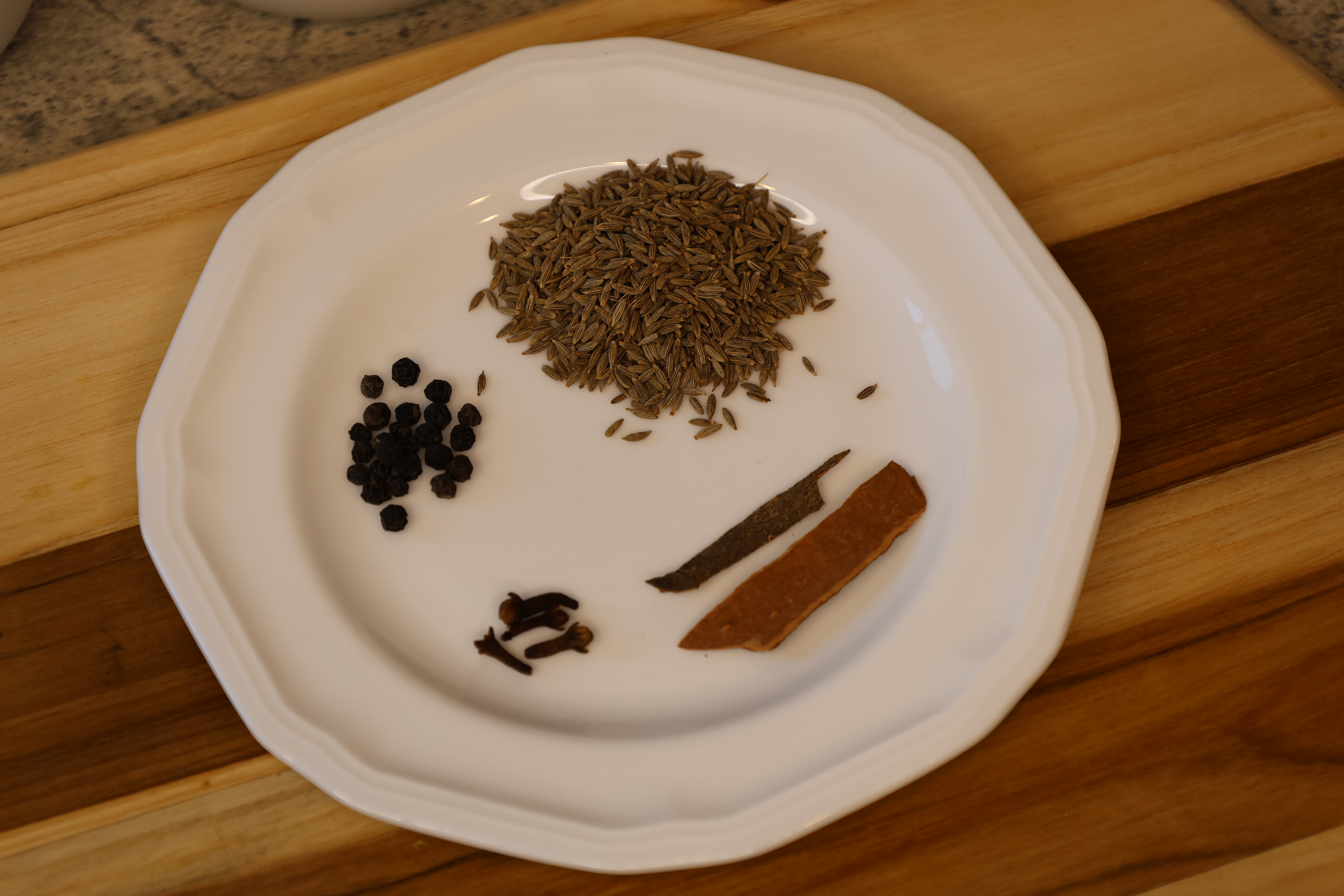 Cumin seeds, black pepper, cloves, cinnamon stick